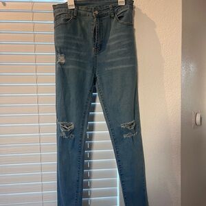 Distressed Blue Jeans
